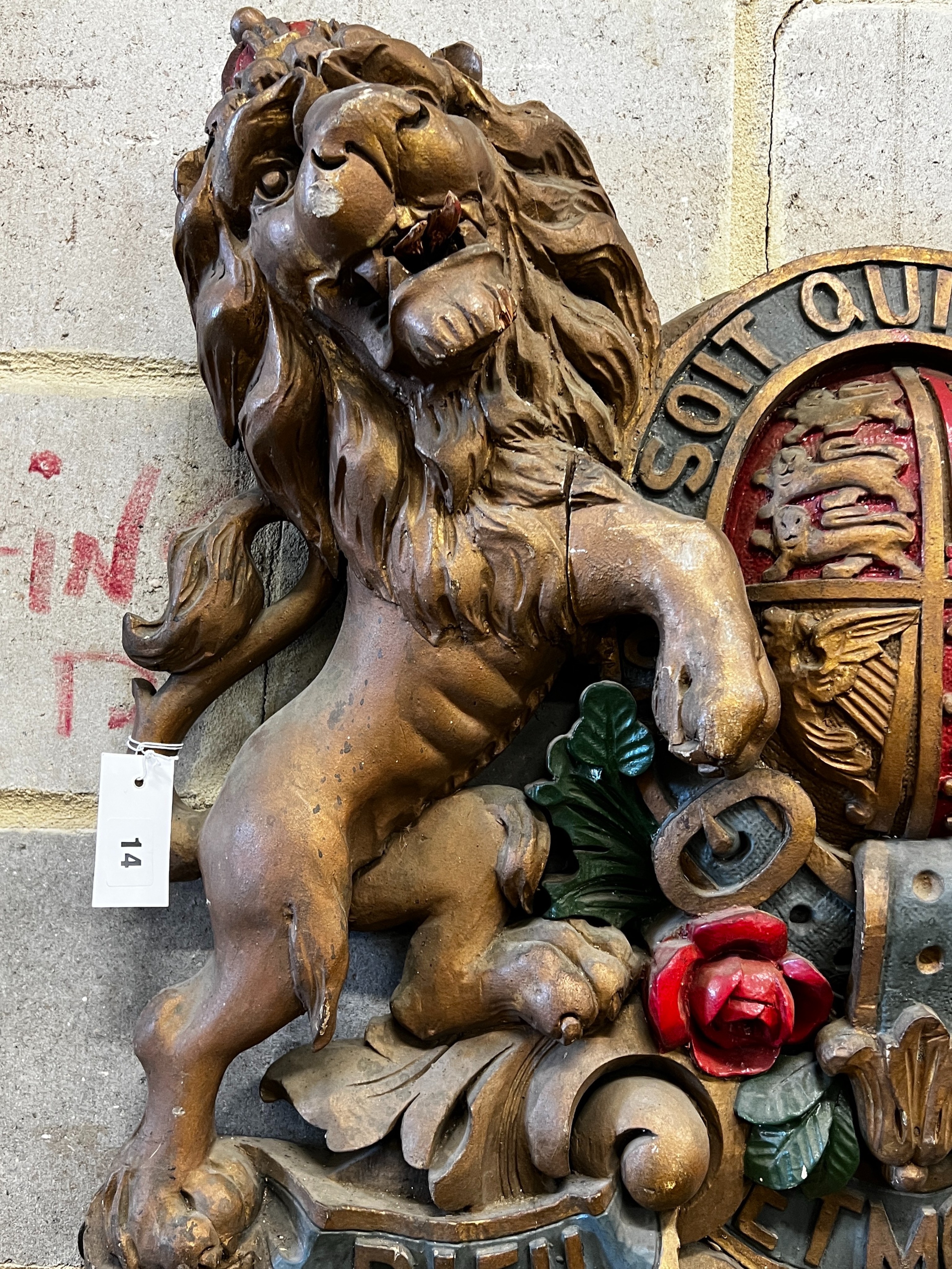 A painted carved wood Royal Coat of Arms, width 76cm, height 62cm